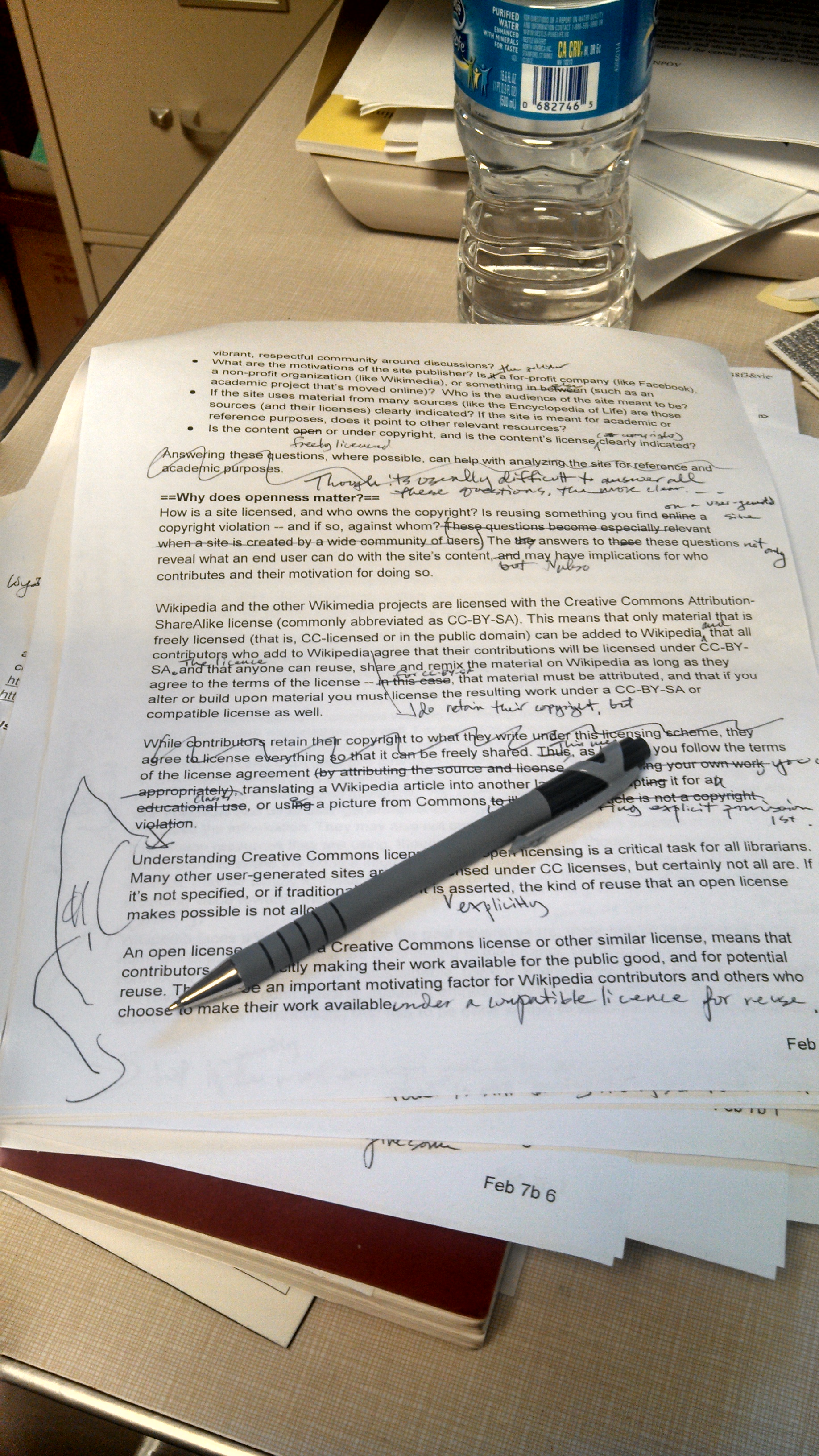 A printed manuscript covered in red-pen edits — the kind of line-by-line content verification autonomous pipelines compress and risk eliminating