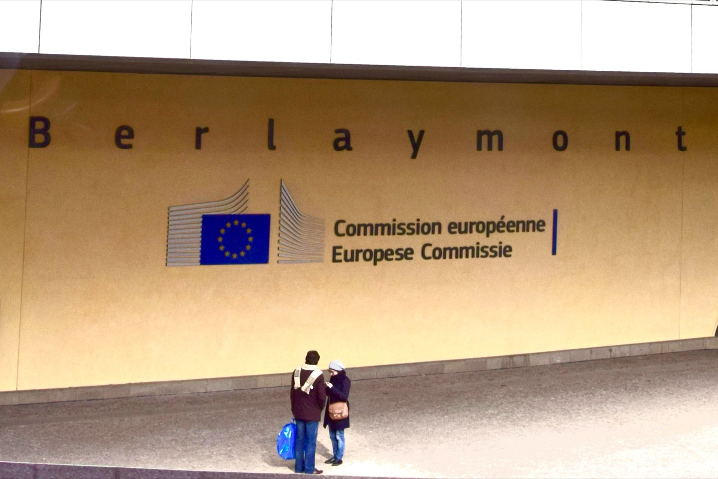 Entrance sign of the Berlaymont building, European Commission headquarters in Brussels — the body overseeing the EU AI Act