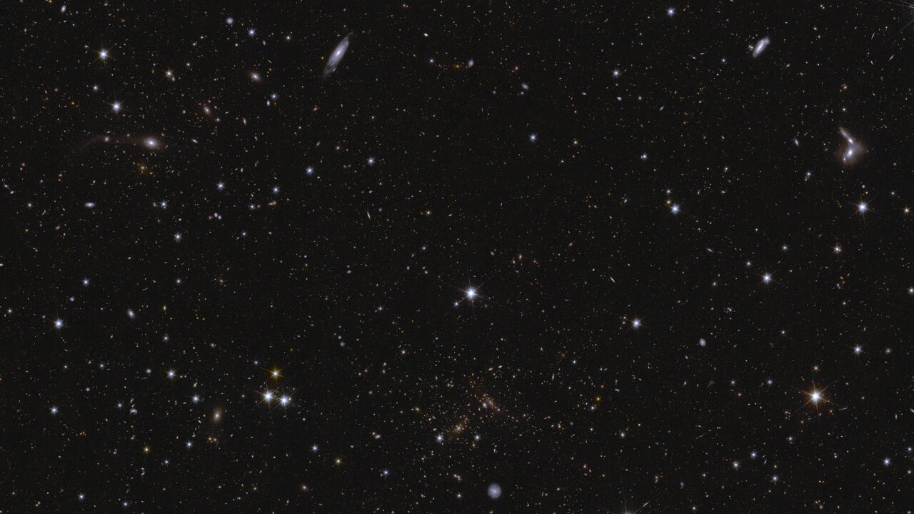 Part of the Euclid Deep Field South, showing galaxies and stars scattered across a dark background