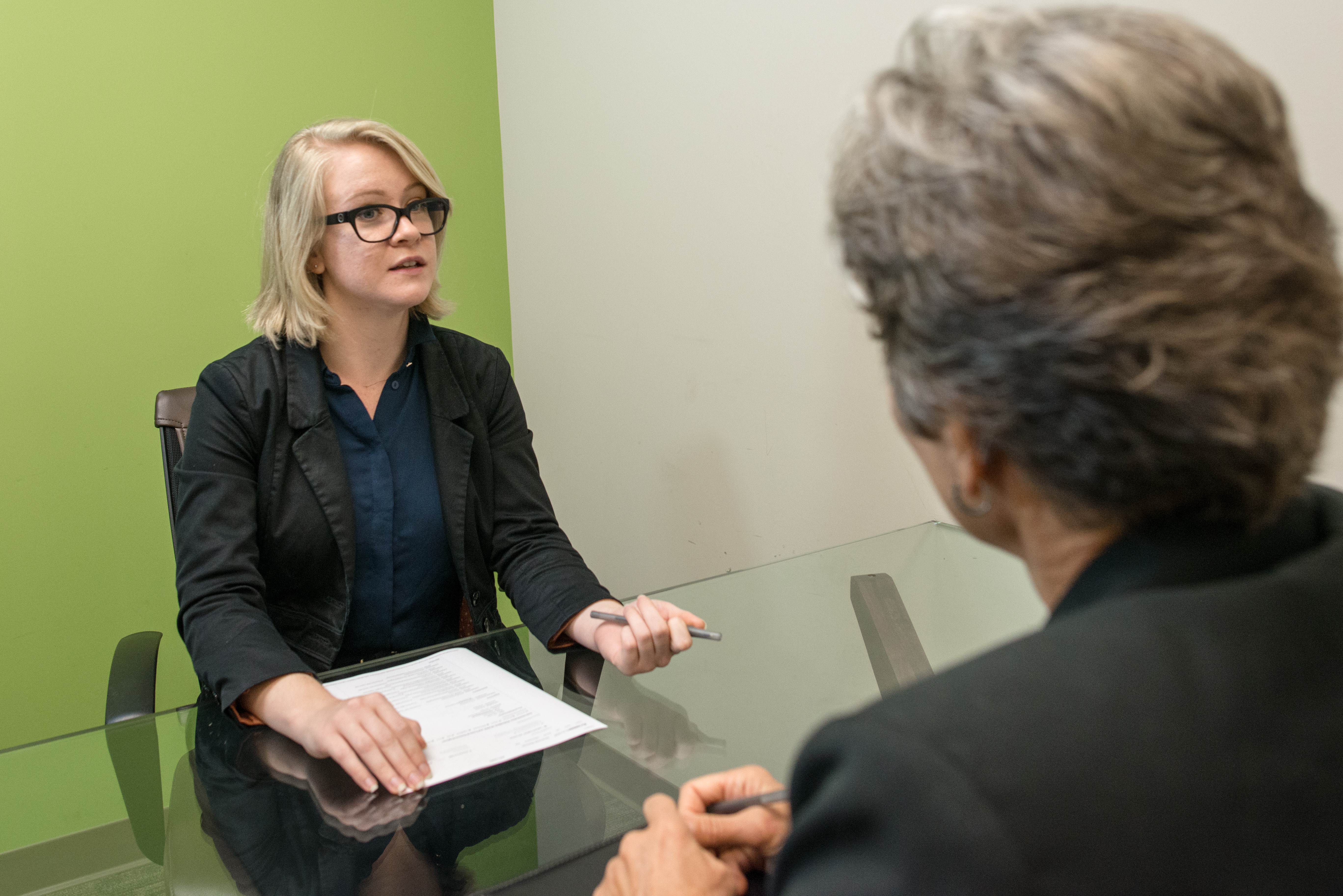 A job interview in progress — EU AI Act Annex III classifies AI spanning the full hiring lifecycle, from résumé ranking to interview assessment, as high-risk