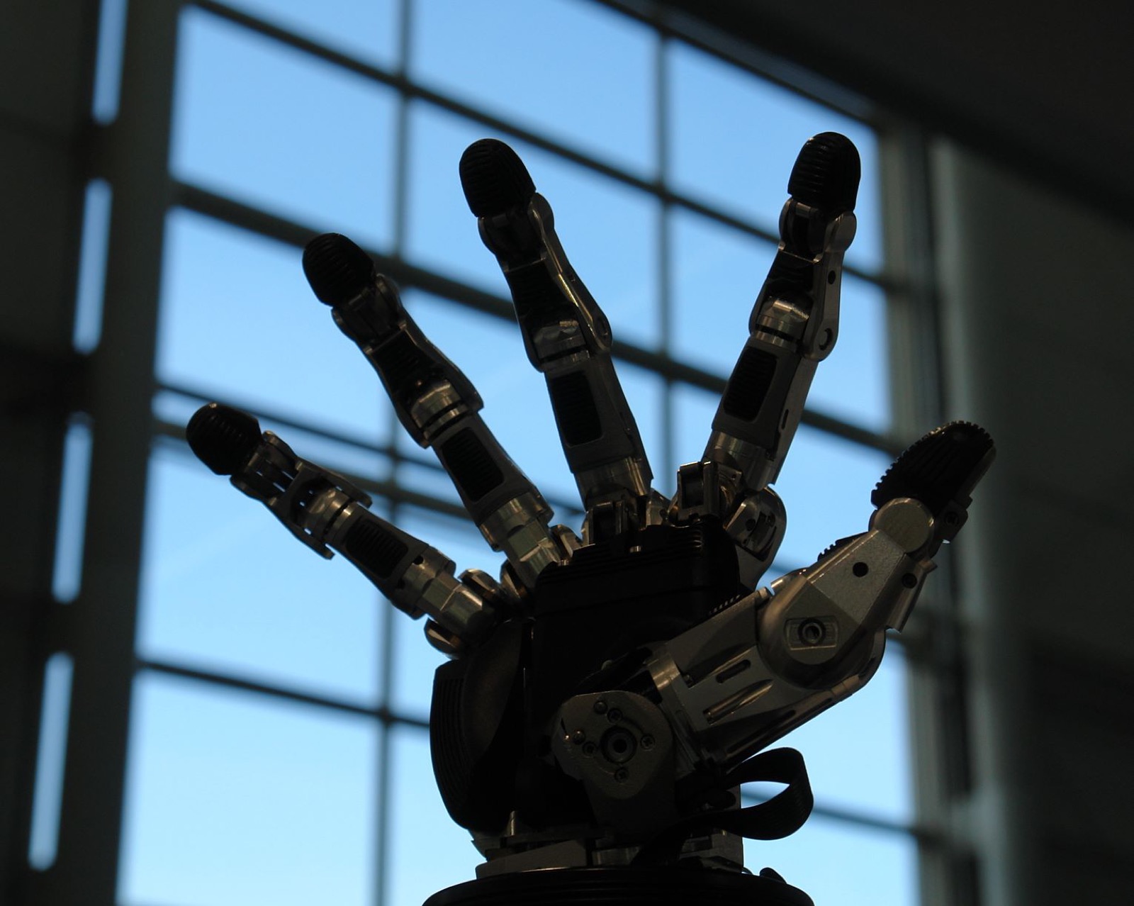 Close-up of a five-fingered robotic hand capable of tactile sensing