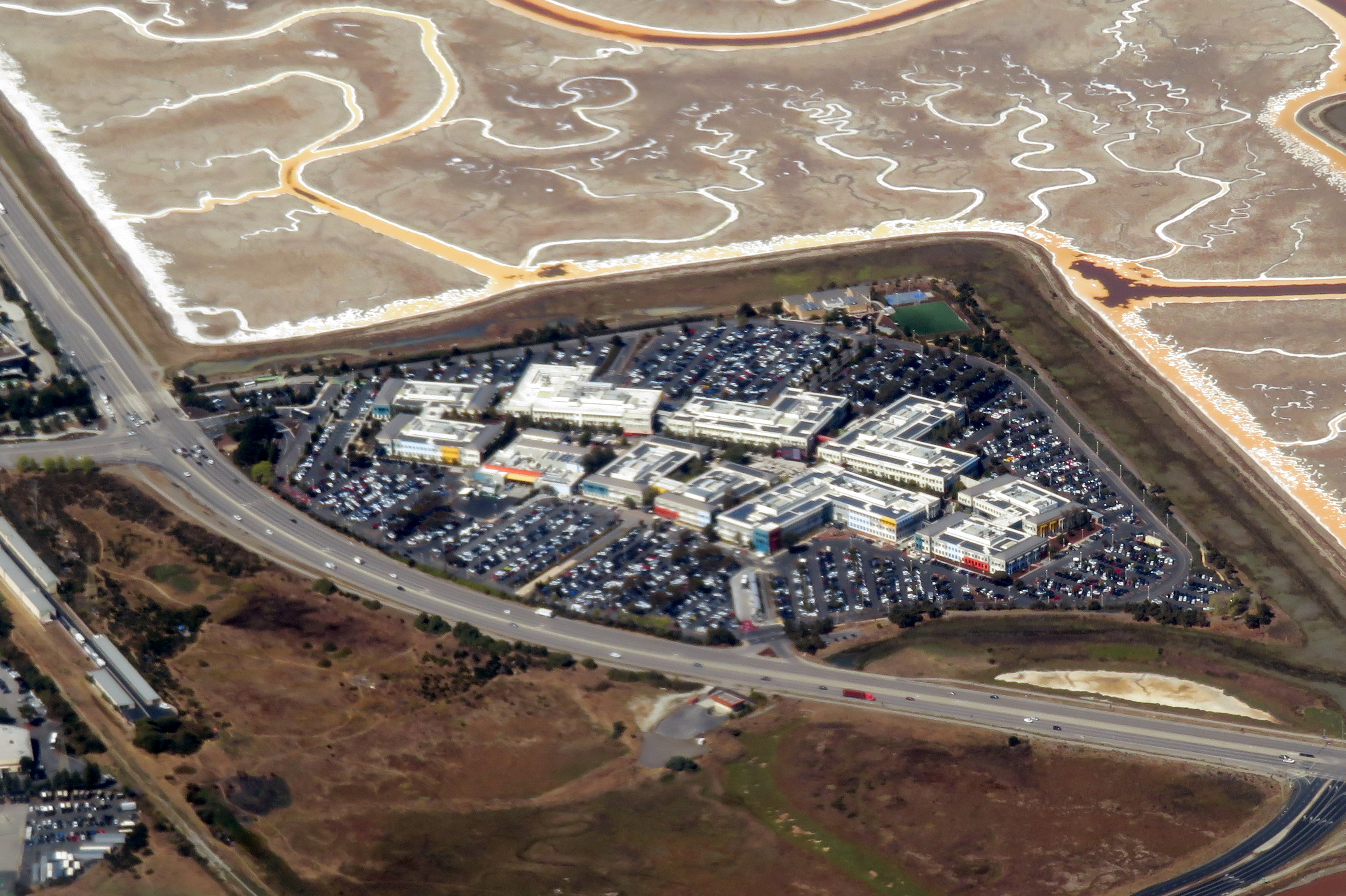 Aerial view of the Facebook (now Meta) campus in Menlo Park, California, 2019 — symbolizing the scale of Meta's data touchpoints underpinning its new closed-model moat
