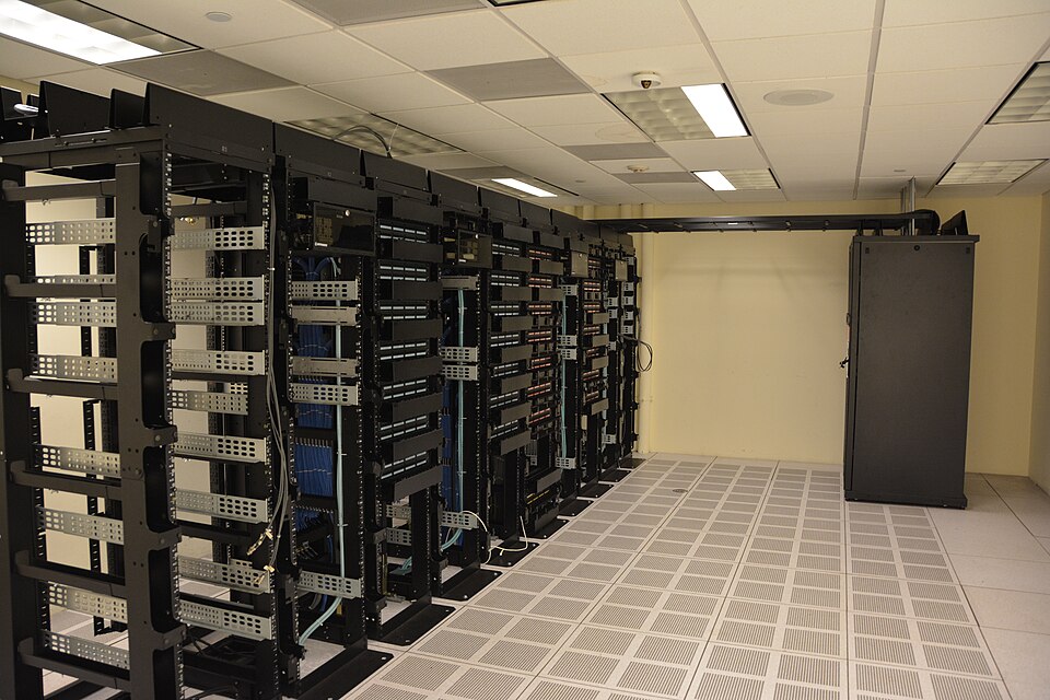 Data center server racks symbolizing scattered institutional data repositories