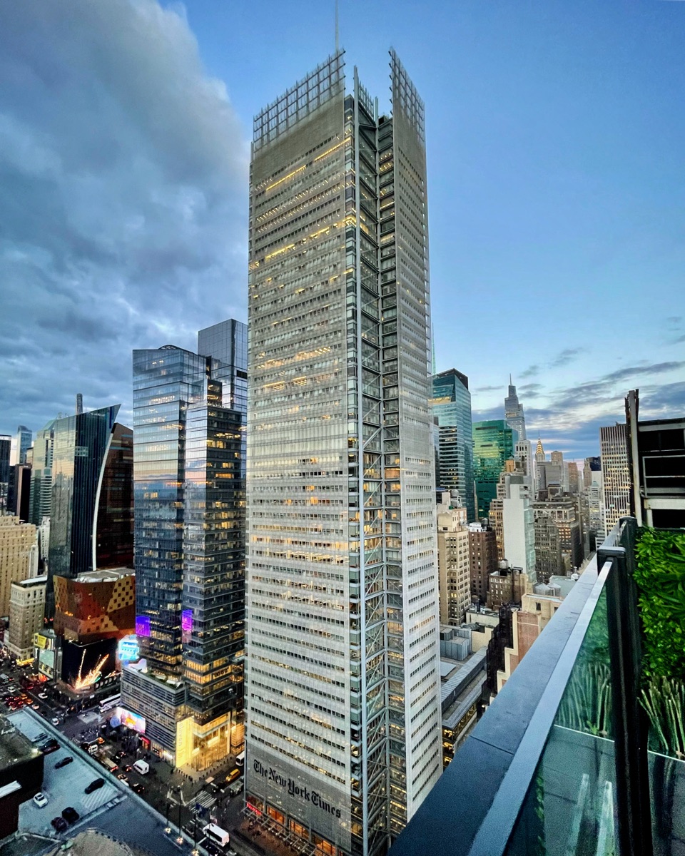 The New York Times headquarters building at dusk, Manhattan