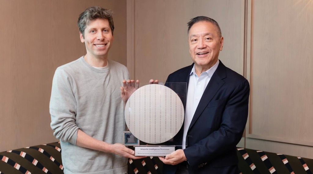 OpenAI CEO Sam Altman (left) and Broadcom CEO Hock Tan holding the Jalapeño Inference Processor semiconductor wafer