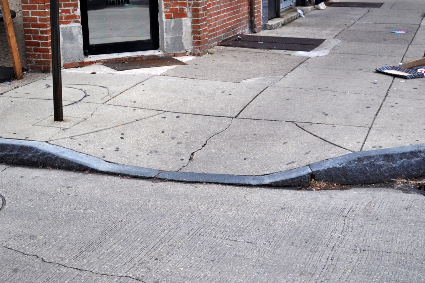A curb cut connecting a sidewalk to the street
