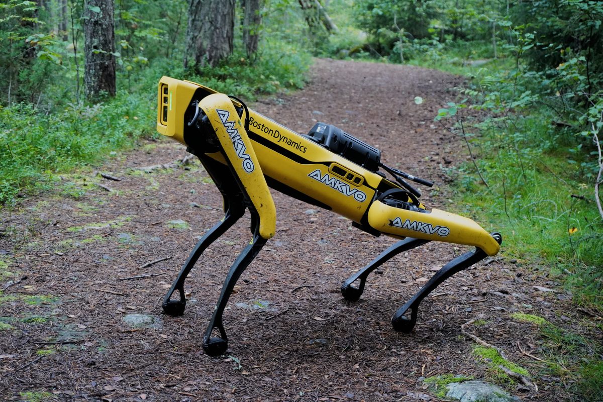 Boston Dynamics Spot quadruped robot — like OpenMind's Bits, autonomous robots now pay for electricity and infrastructure using USDC nano-payments
