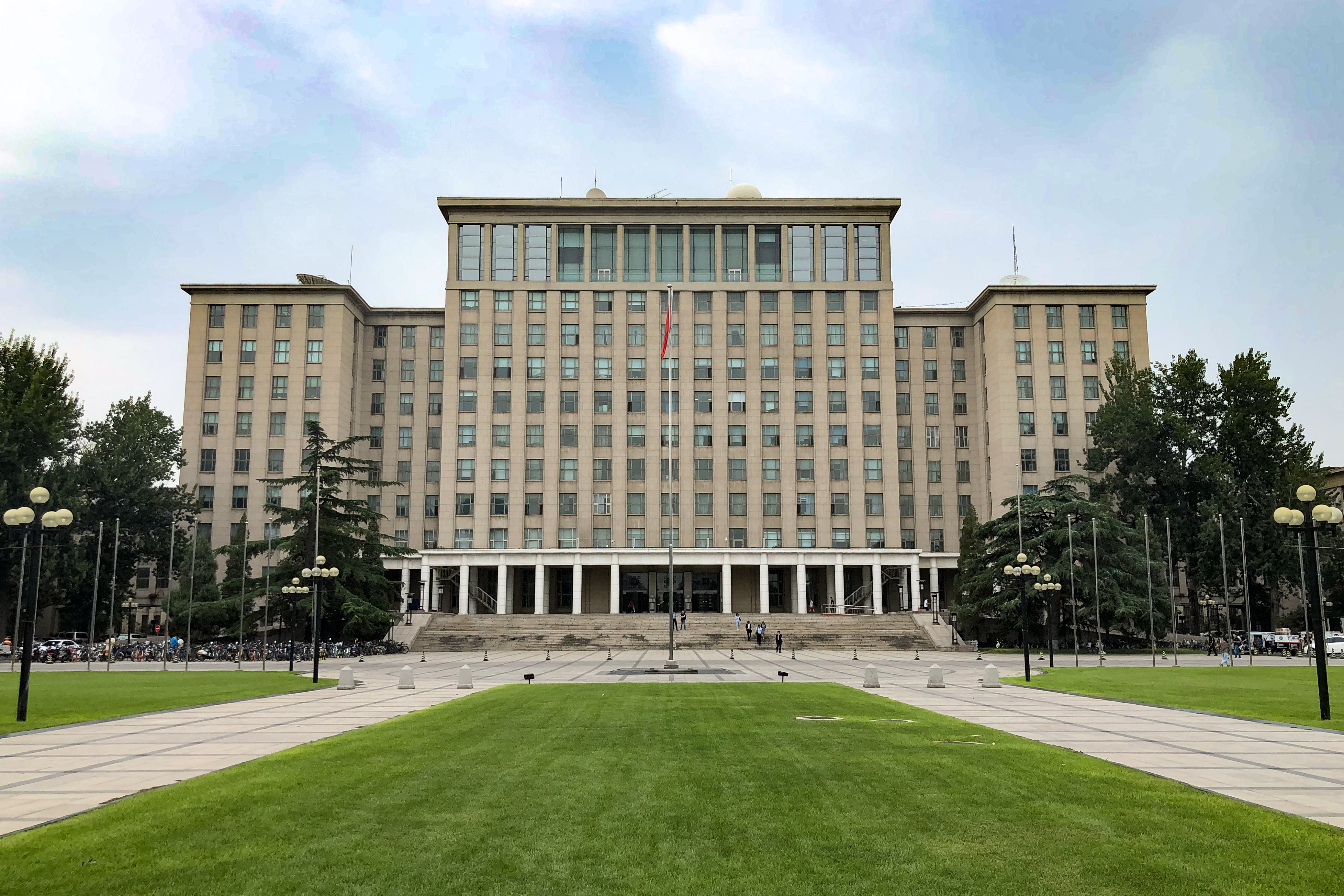 Tsinghua University main building — home of co-authors Hao, Xu, and Li