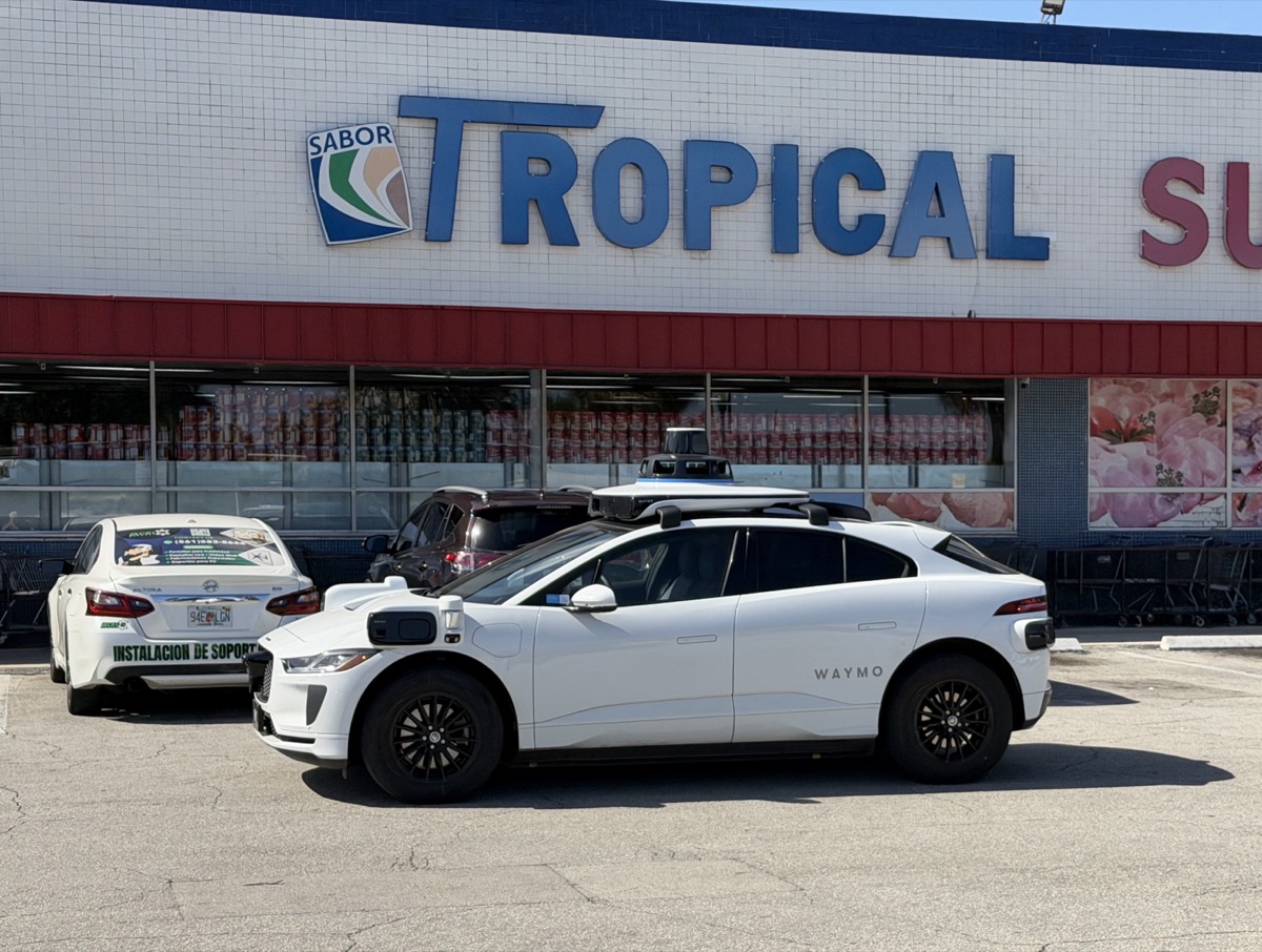 Waymo Jaguar I-Pace autonomous vehicle on public roads in West Miami, Florida, April 2026